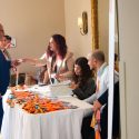 Woman giving lanyard